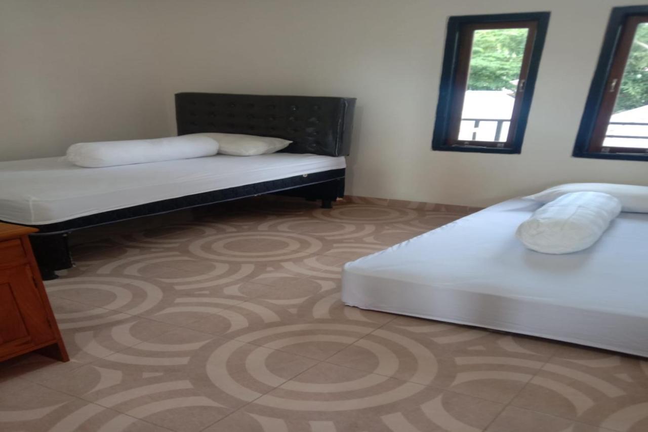Express O 91722 Home Stay Dan Sewa Mobil Jhon'S Family Labuan Bajo Exterior photo